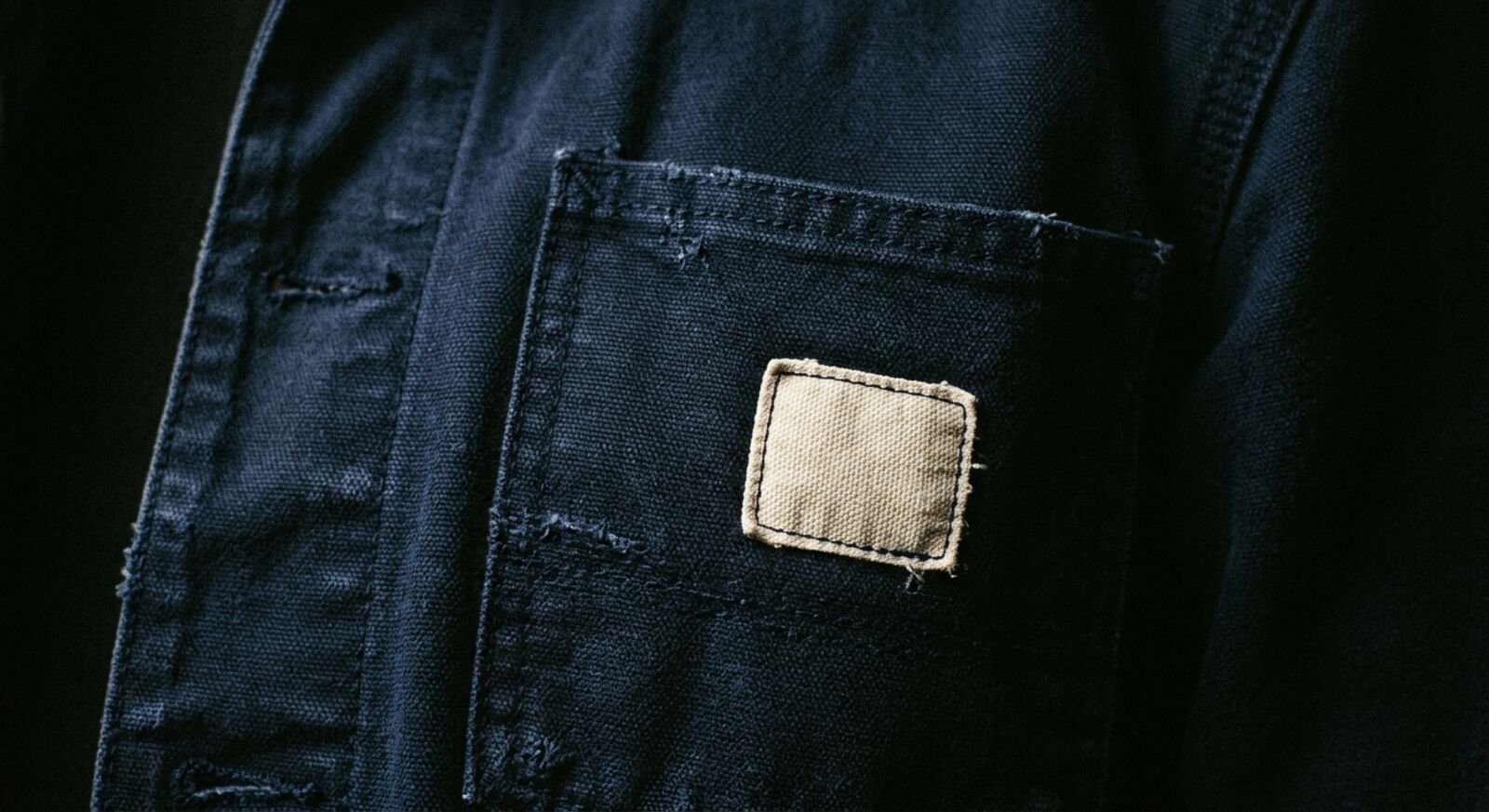 Poche de veste de travail en tissu bleu